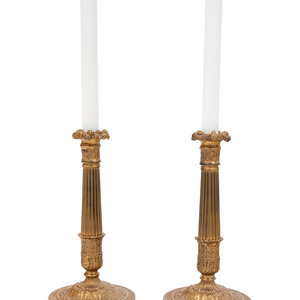 Appraisal: A Pair of French Gilt Metal Candlesticks Mounted as Lamps