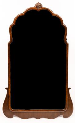 Appraisal: A mahogany wall mirror with moulded frame and arched top