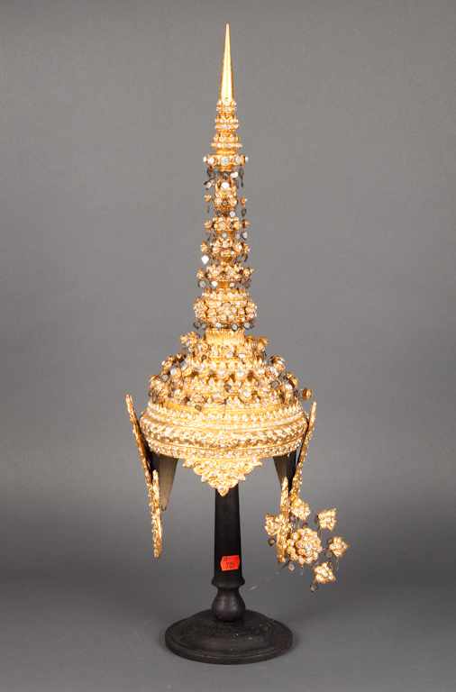 Appraisal: Thai faux jewel encrusted gilt ceremonial hat with stand in