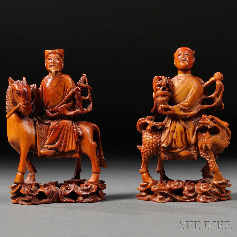 Appraisal: Two Ivory Carvings of Riders on Stands China th century