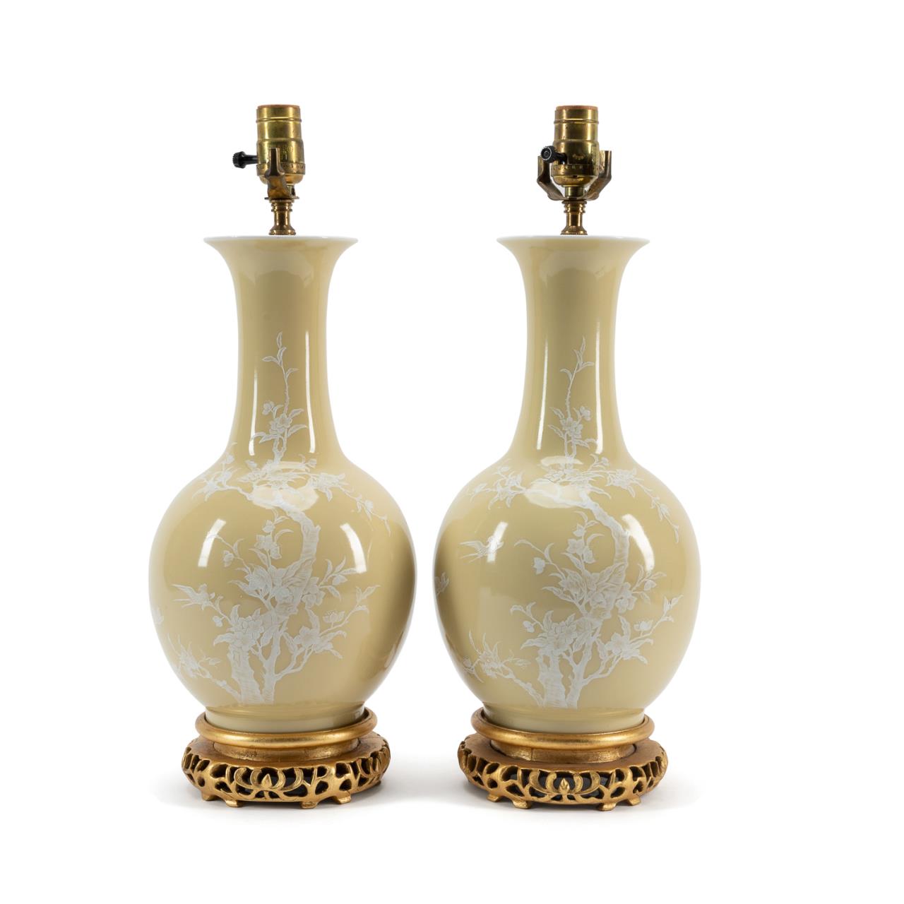 Appraisal: PR CHINESE YELLOW GLAZE FLOWERING TREE LAMPS Pair of Chinese