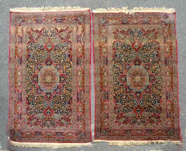 Appraisal: A PAIR OF OLD PERSIAN RUGS each decorated a central