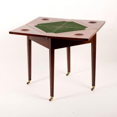 Appraisal: An Edwardian mahogany envelope card table cm wide