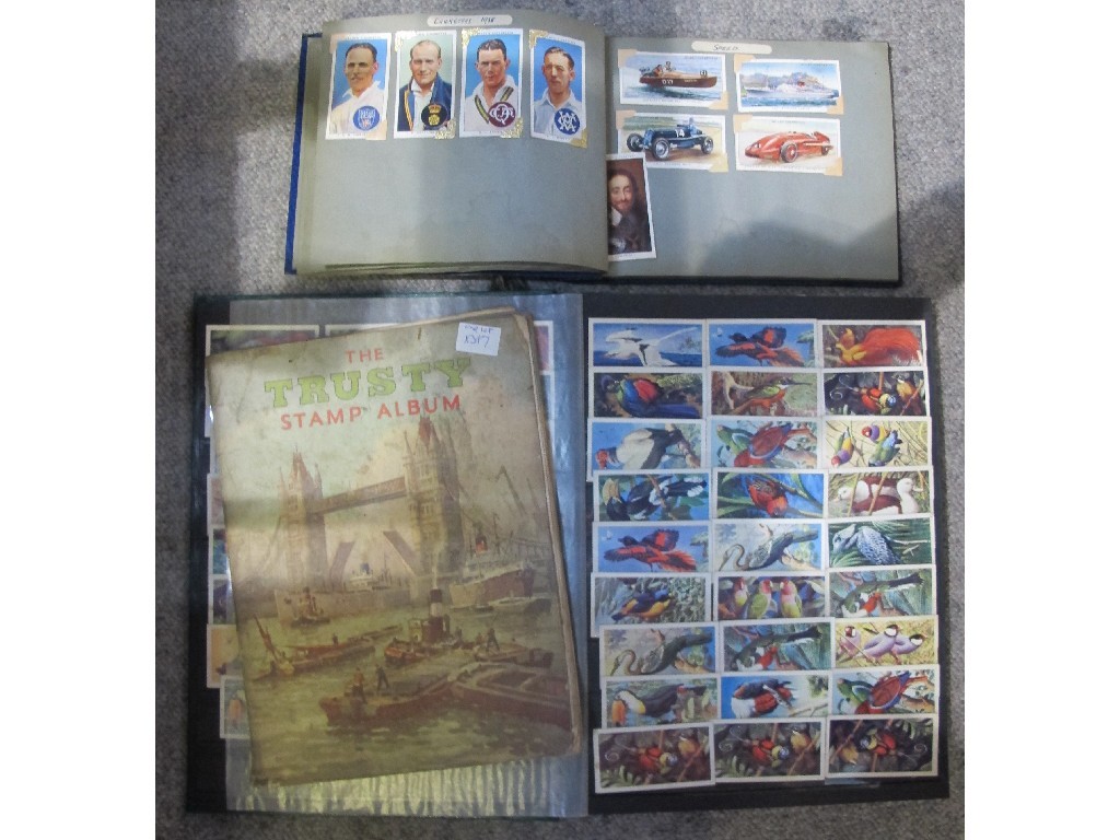 Appraisal: Lot comprising two albums of cigarette cards and an album