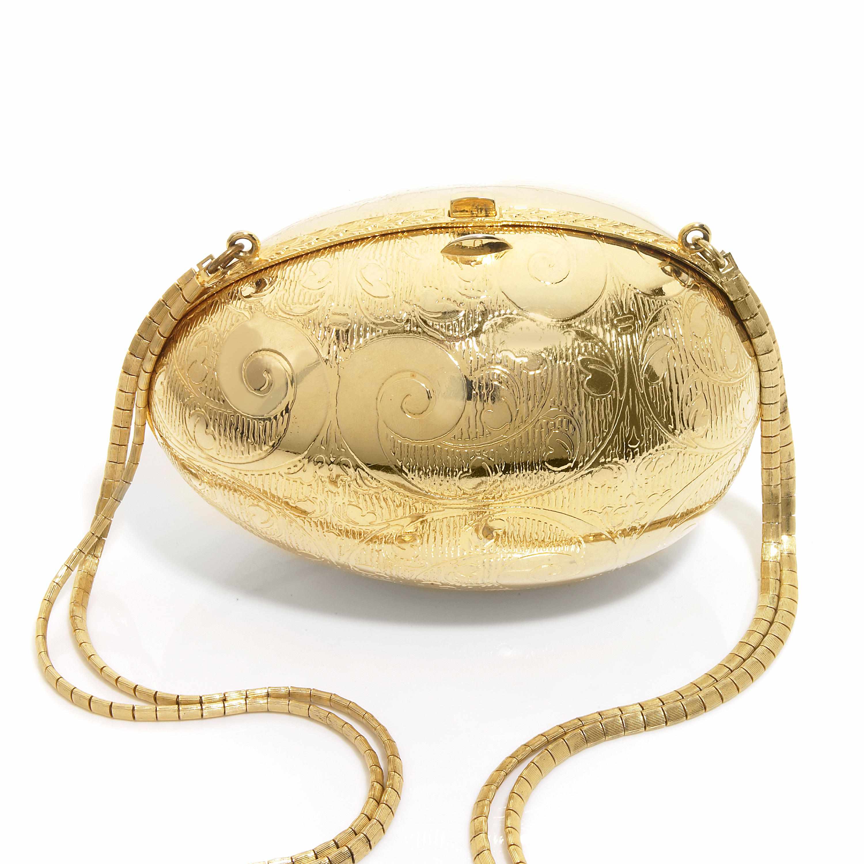 Appraisal: A gold colored metal egg purse Judith Leiber with attached