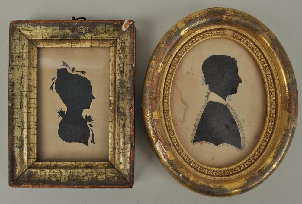 Appraisal: Two Hollow Cut Silhouette Portraits cut paper over fabric with