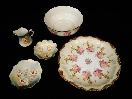 Appraisal: Continental porcelain five pieces floral themed three piece set with