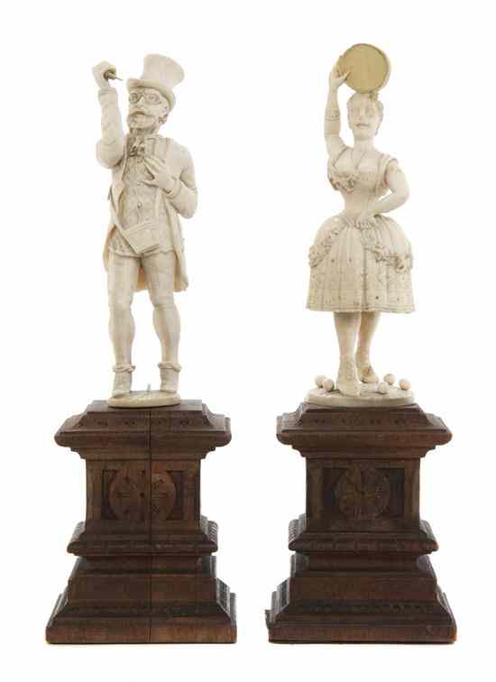 Appraisal: Two Continental Ivory Figures depicting a gentleman in a top