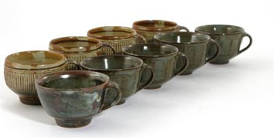 Appraisal: Michael Cardew - four Wenford Bridge earthenware tea cups glazed