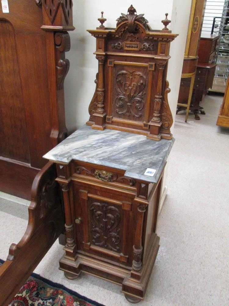 Appraisal: A PAIR OF CARVED WALNUT NIGHTSTANDS Renaissance style German late