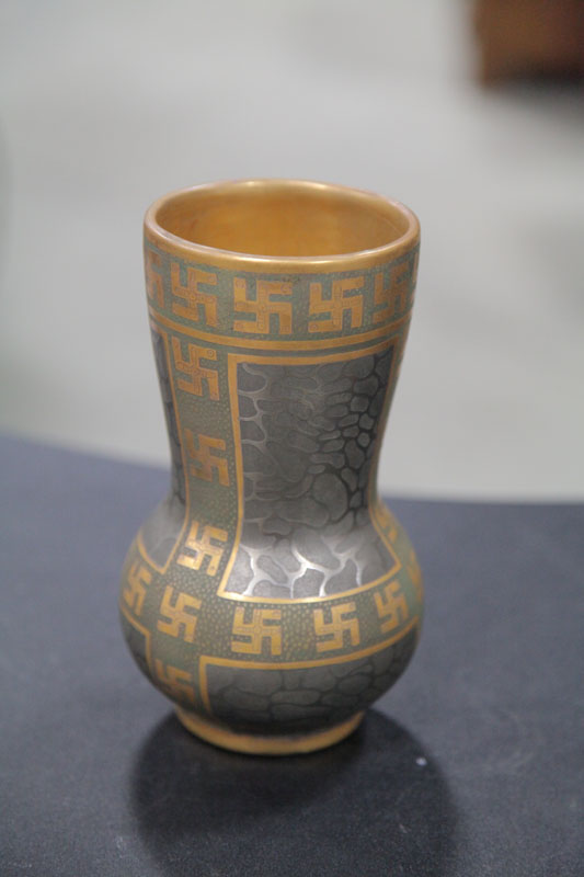 Appraisal: SWASTIKA KERAMOS POTTERY VASE Bulbous vase having gold Swstika motifs