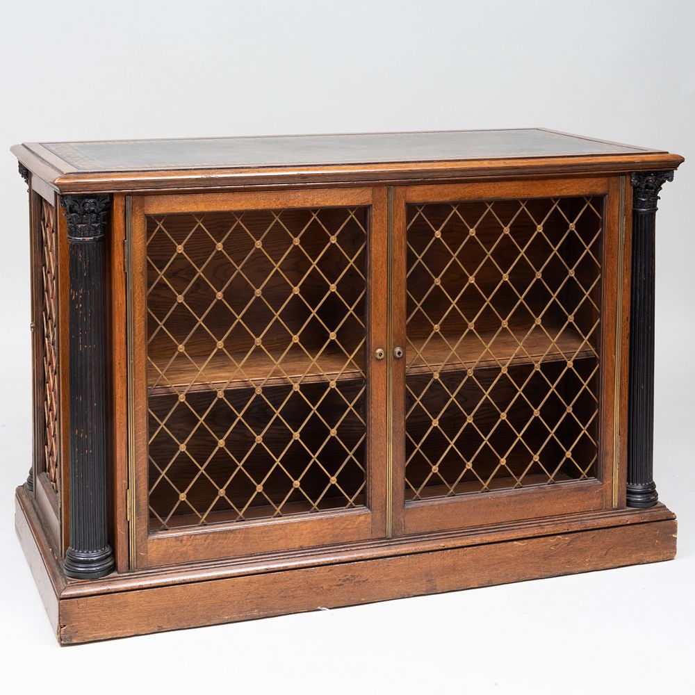 Appraisal: Victorian Brass-Mounted Mahogany and Ebonized Double Sided Library Bookcase Fitted