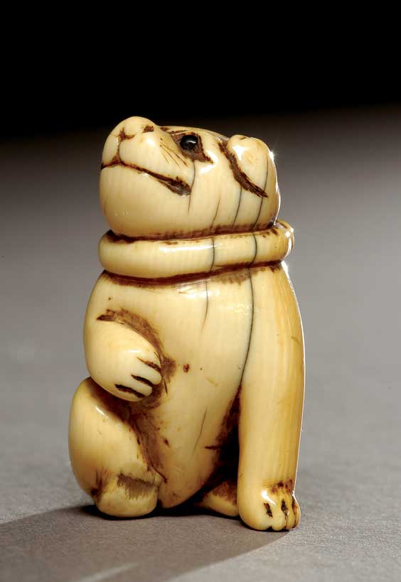 Appraisal: ANTIQUE IVORY NETSUKE Antique well carved and polished ivory netsuke