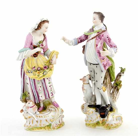 Appraisal: Pair German porcelain figures early th century standing man and