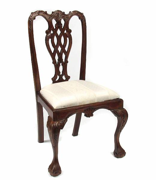 Appraisal: A set of four Chippendale style mahogany dining chairs height