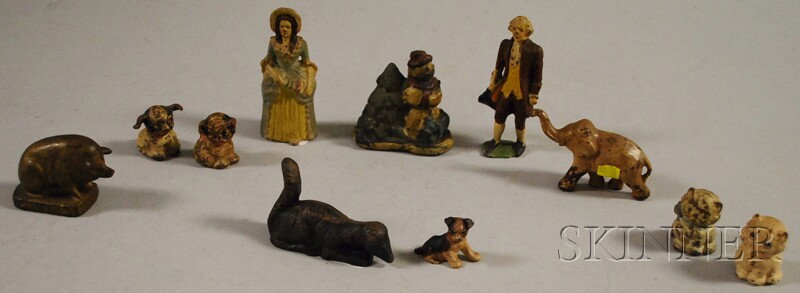 Appraisal: Eleven Assorted Small Cast Iron Figures polychrome decorated including a