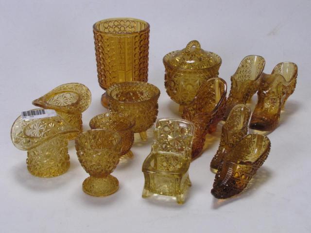 Appraisal: Group of Antique Amber Glass including five boots lidded sugar