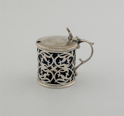 Appraisal: A Victorian pierced drum mustard pot with an engraved cover