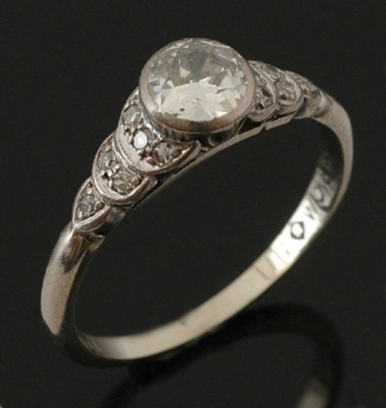 Appraisal: A solitaire diamond ring The old European cut diamond weighing