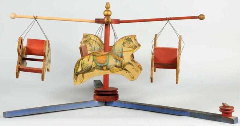 Appraisal: Early Paper on Wood Carousel Toy Depicts horses that move