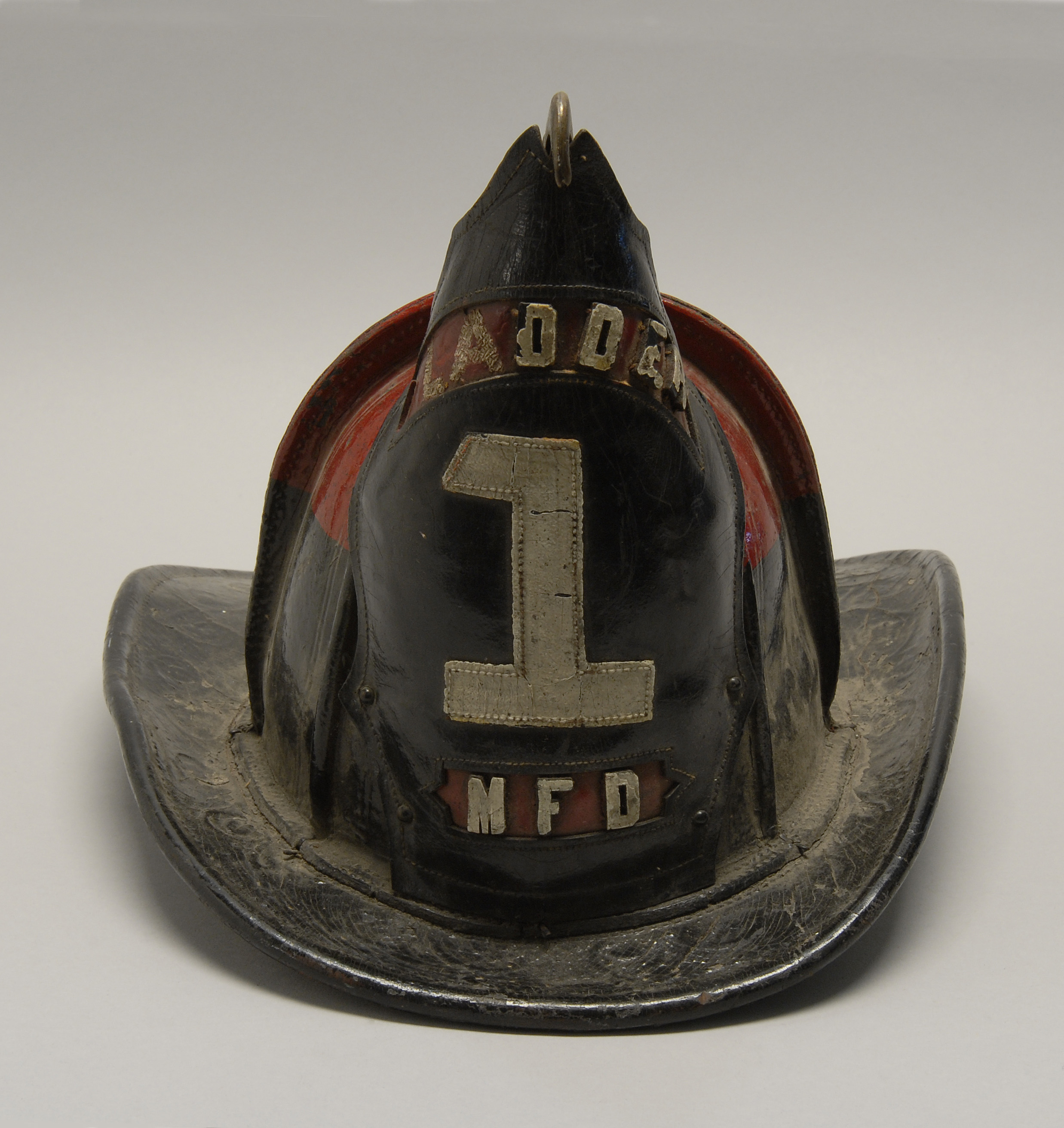 Appraisal: BRASS AND LEATHER FIRE HELMET Mid- th CenturyFrom the Medford