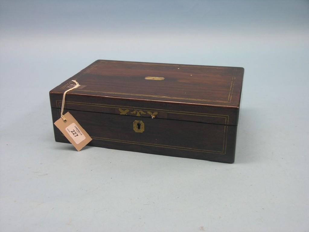 Appraisal: An early Victorian brass-inlaid rosewood writing box enclosed slope and