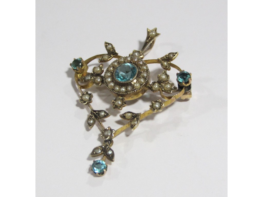 Appraisal: An Edwardian gold aquamarine and seed pearl set holbein pendant