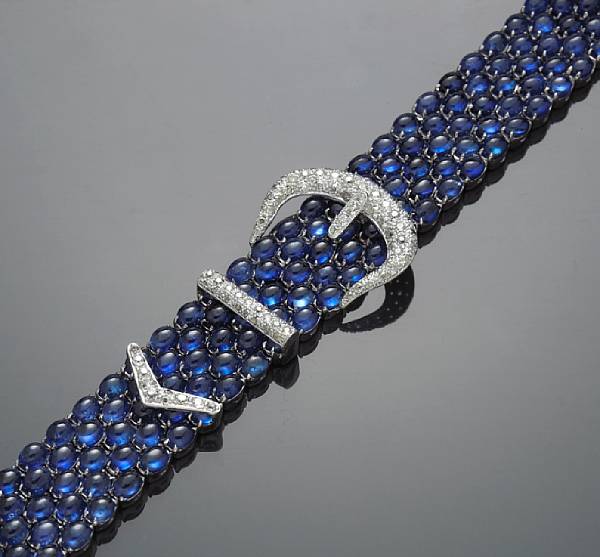 Appraisal: A cabochon sapphire and diamond buckle style bracelet estimated total