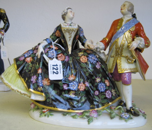 Appraisal: A Meissen figure group th century modelled as gallant and