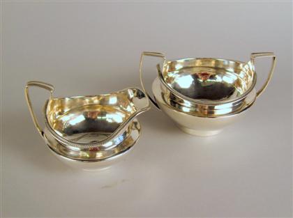 Appraisal: George III sterling silver cream jug and sugar bowl robert