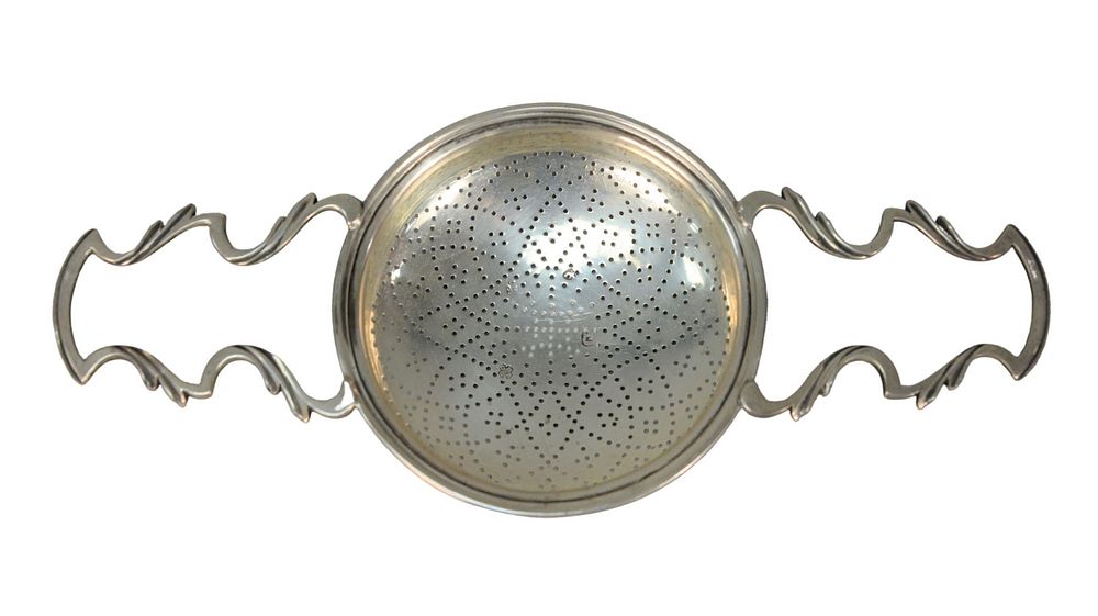 Appraisal: English Silver Strainer with two handles length inches troy ounces