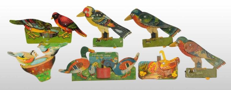 Appraisal: Lot of Tin Assorted Bird Clicker Toys Description German Working