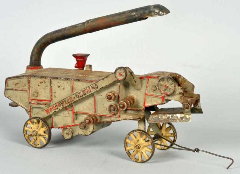 Appraisal: Cast Iron Arcade Farm Toy American Marked McCormick-Deering Original tin