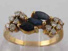 Appraisal: A yellow metal tests carat gold sapphire and diamond ring