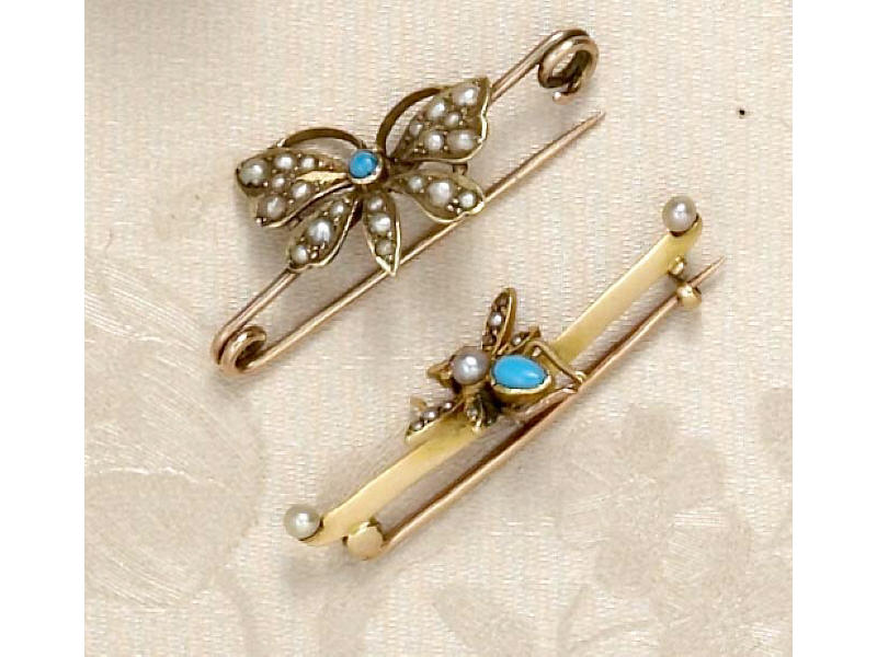 Appraisal: TWO ANTIQUE BUG PINS A k yellow gold late Victorian