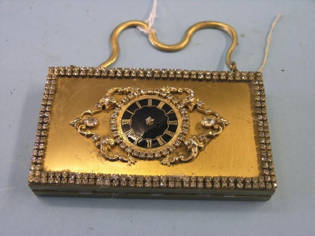 Appraisal: An unusual 's compact paste-set cover with central enamel clock