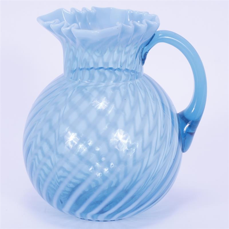 Appraisal: Northwood Glass Blue Opalescent Ball Shape Water Pitcher in Swirl