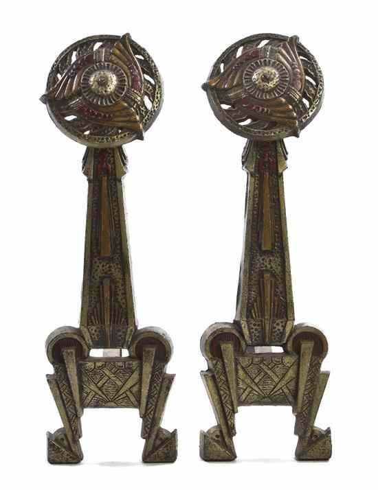 Appraisal: A Pair of Art Deco Cast Metal Andirons each having