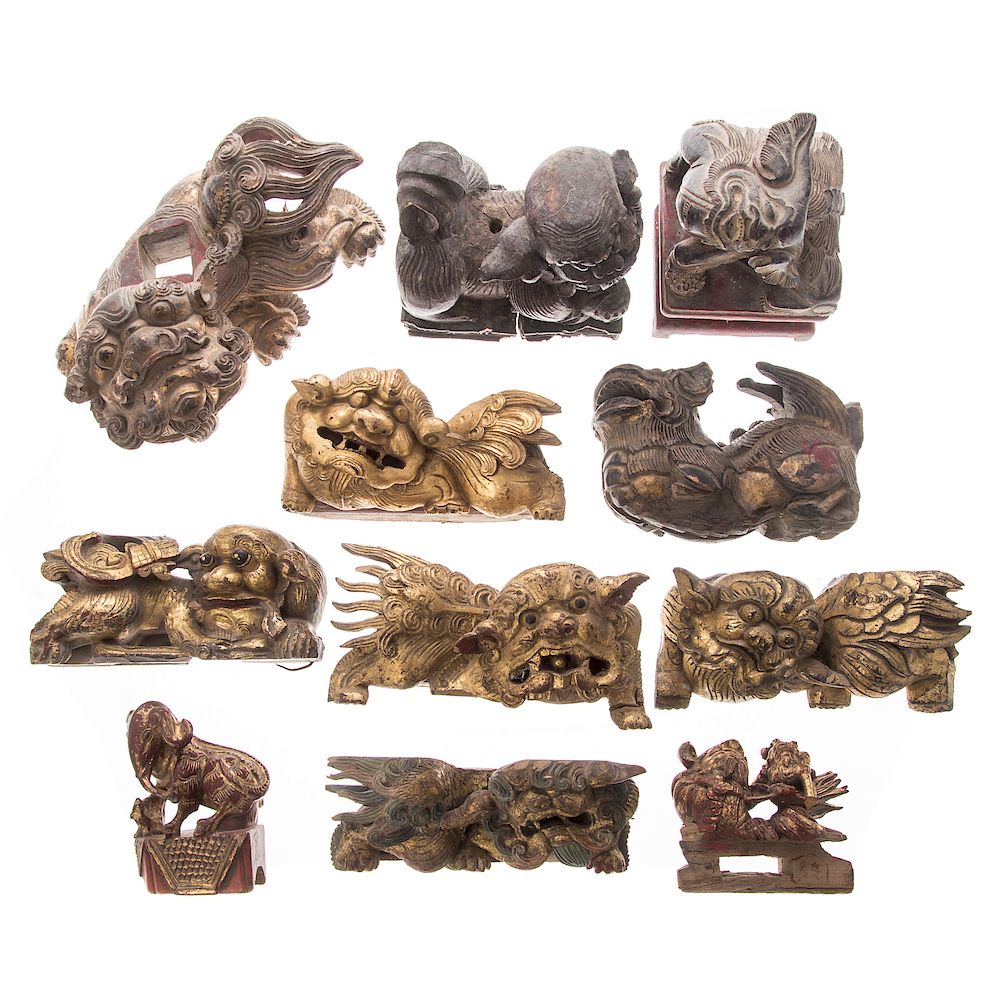 Appraisal: Ten Chinese Carved Wood Foo Dog Figures late th th