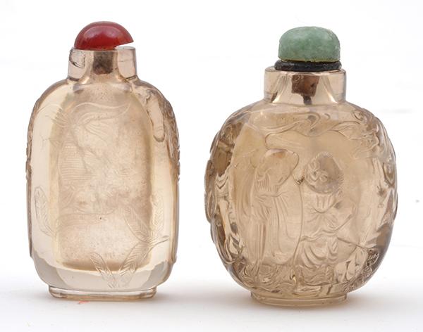 Appraisal: TWO CARVED ROCK CRYSTAL SNUFF BOTTLES TH CENTURY