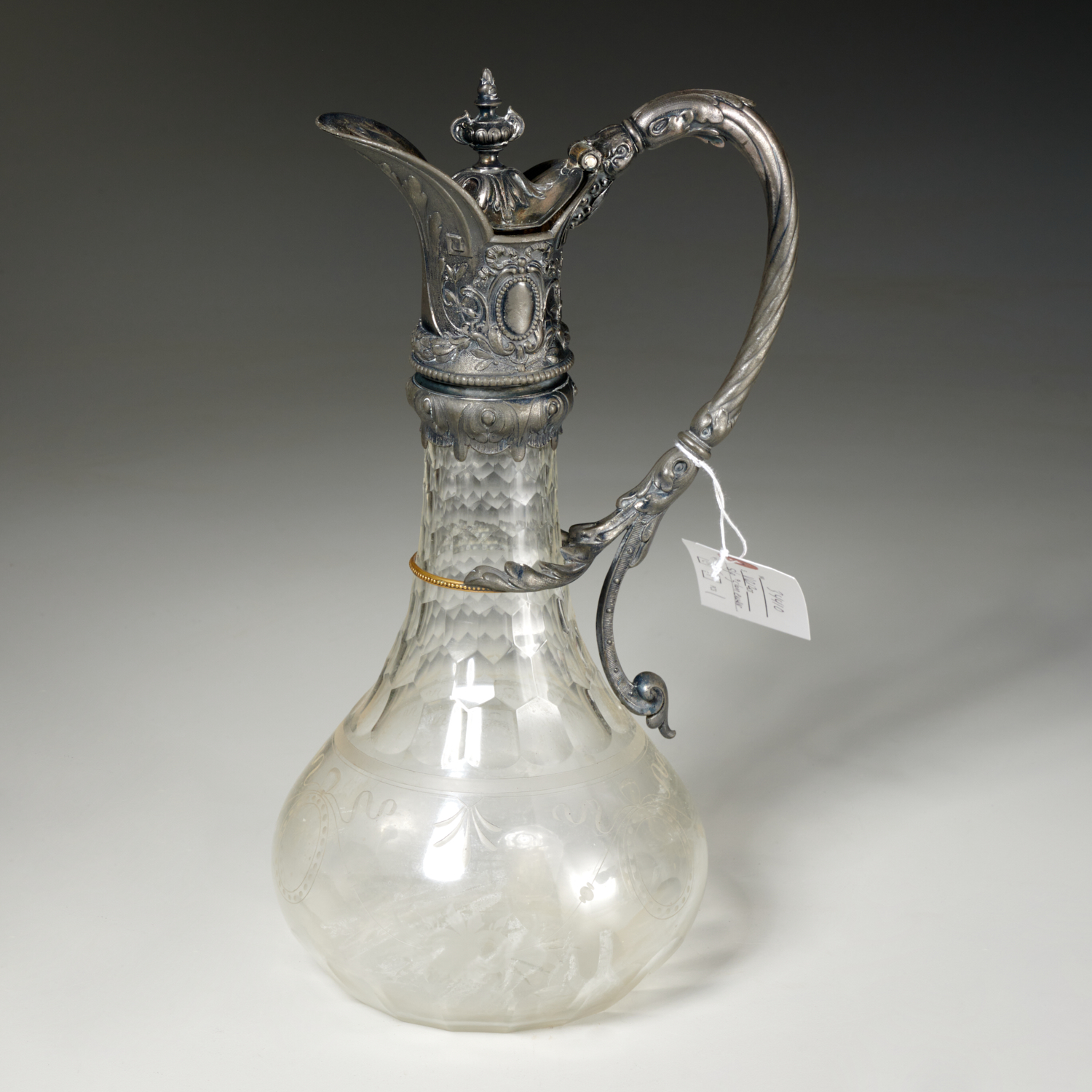 Appraisal: VICTORIAN STYLE ETCHED GLASS SILVERPLATE EWER th th c ornate