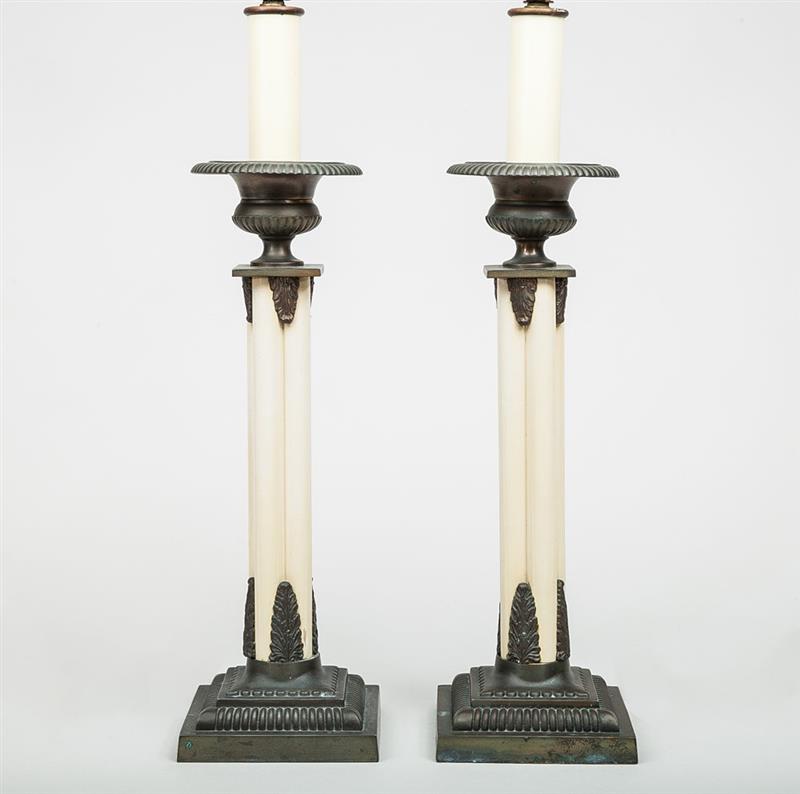 Appraisal: Pair of Silvered Metal-Mounted Cream Painted Lamps The sockets labeled