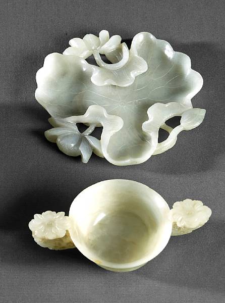 Appraisal: Two jade carvings The first a libation cup with two