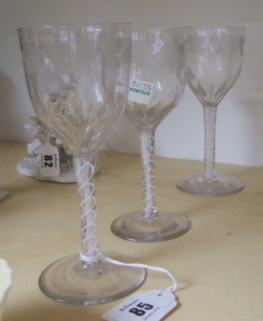 Appraisal: Three engraved opaque twist wine glasses circa cm high chip