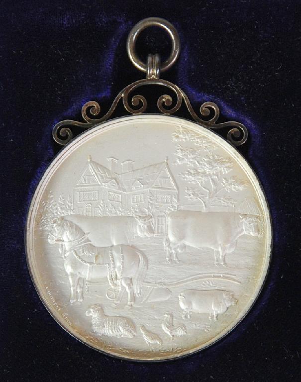 Appraisal: EDWARDIAN SILVER HORTICULTURAL MEDALLION inscribed 'Deane District Agricultural and Horticultural