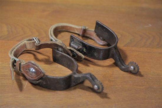 Appraisal: PAIR OF SPURS Brown leather straps with silver trim Stamped