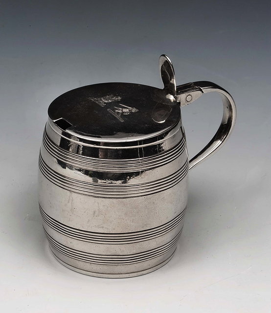 Appraisal: A GEORGE III SILVER MUSTARD POT in the form of