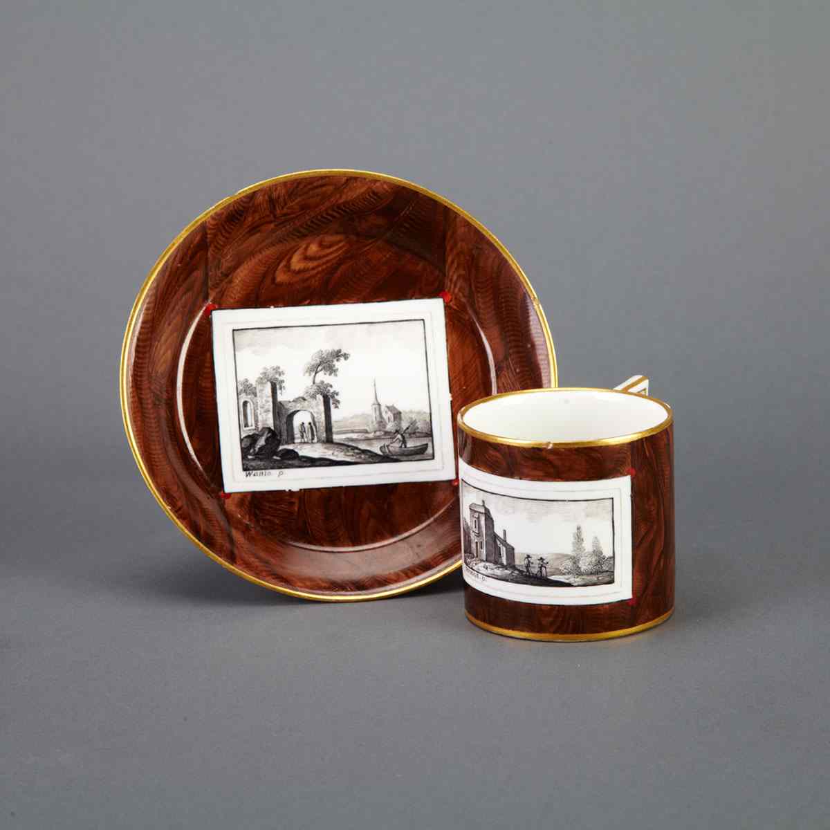 Appraisal: Vienna Faux Bois Ground Coffee Can and Saucer c diameter