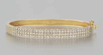 Appraisal: A Ladies' Diamond Bangle Bracelet k yellow gold hinged bangle