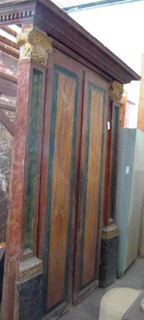 Appraisal: CONTINENTAL PAINTED WOOD DOOR FRAME AND PAIR OF DOORS possibly